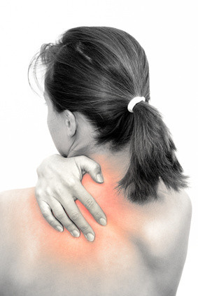 Woman experiencing neck pain