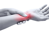 Person experiencing wrist pain